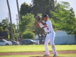 Spartans win pair from Trinity Christian