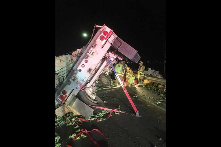 Tractor trailer crash slows down 101